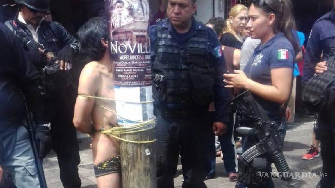 En Morelia, comerciantes desnudan, amarran e intentan linchar a presunto asaltante