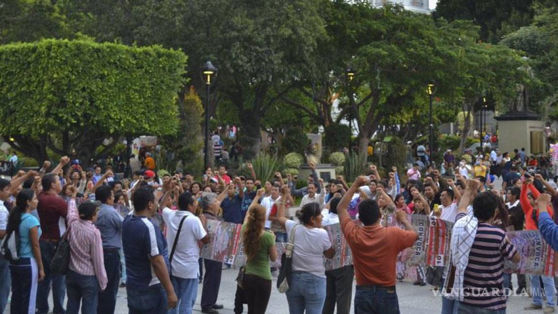Aparecen dos de los 57 normalistas de Ayotzinapa