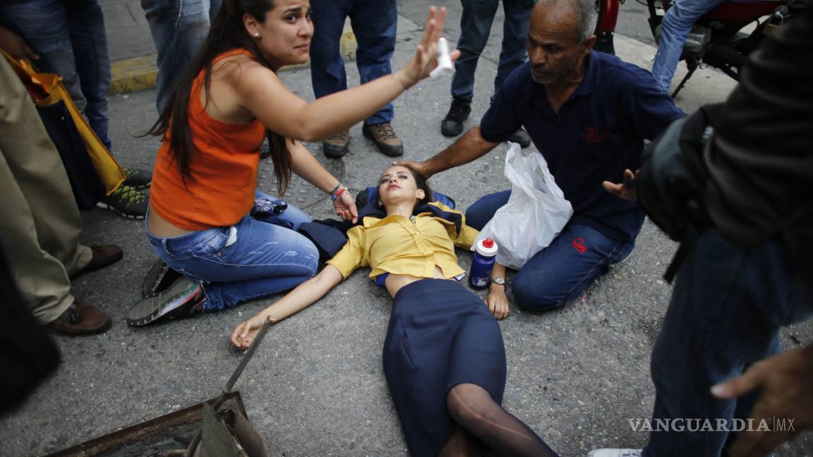 Sube a 21 la cifra de muertos tras protestas en Venezuela