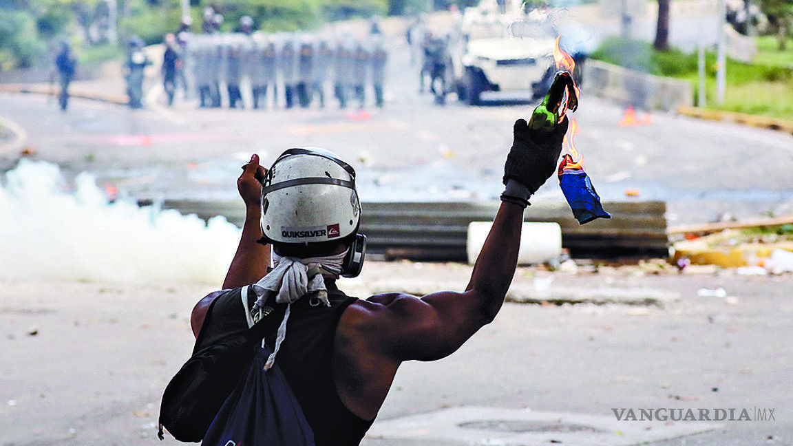 Dos muertos y casi 200 detenidos en paro general en Venezuela