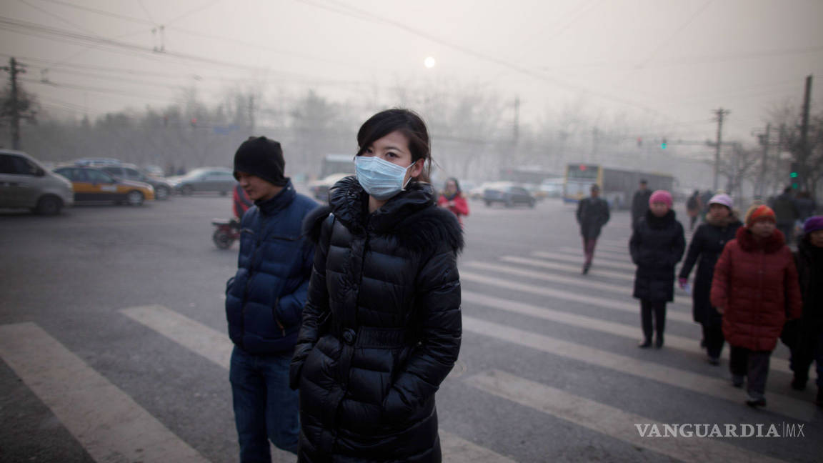 Emite Beijing alerta naranja por contaminación