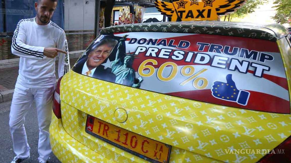 Taxista albanés decora su auto con fotos de Donald Trump