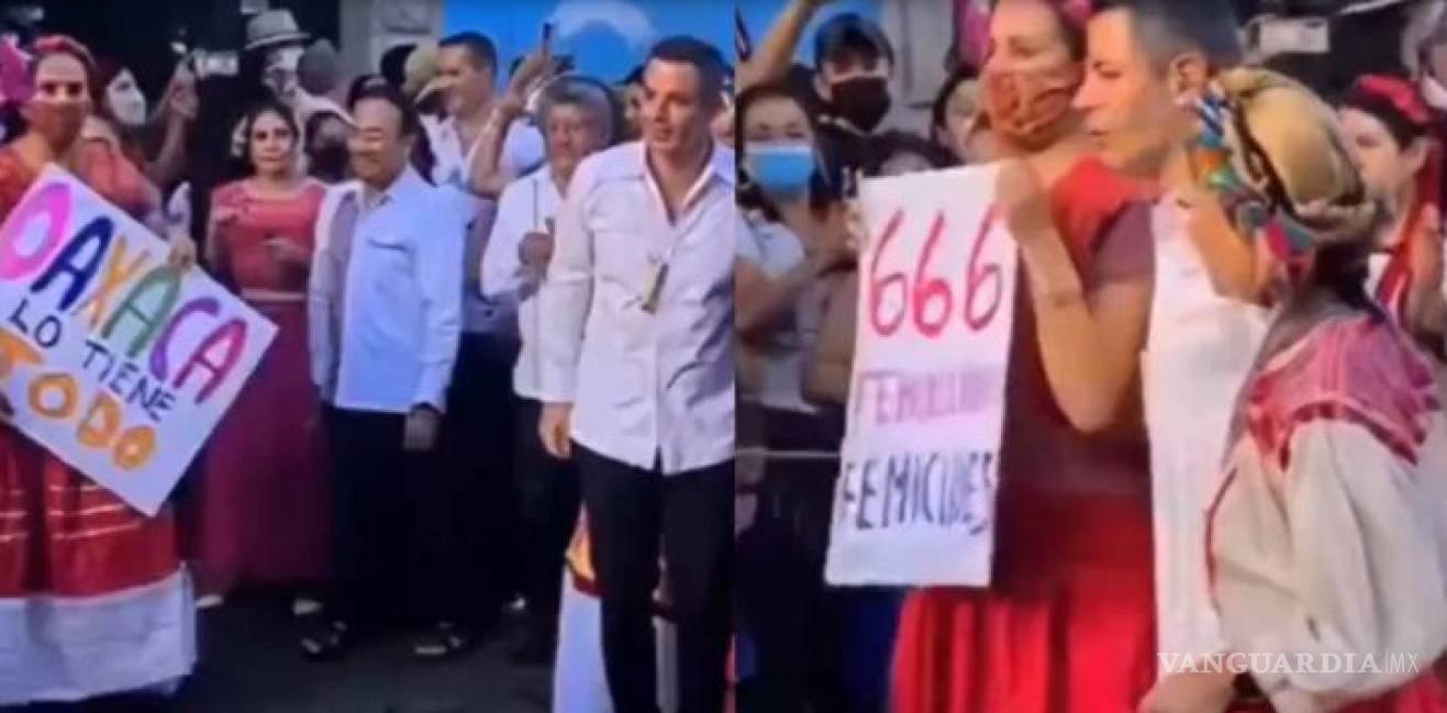 Engañan al gobernador de Oaxaca y posa con cartulina sobre feminicidios