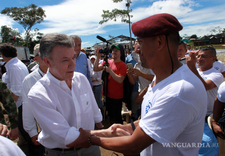 $!'Hoy las armas se cambiaron por las palabras': Presidente de Colombia
