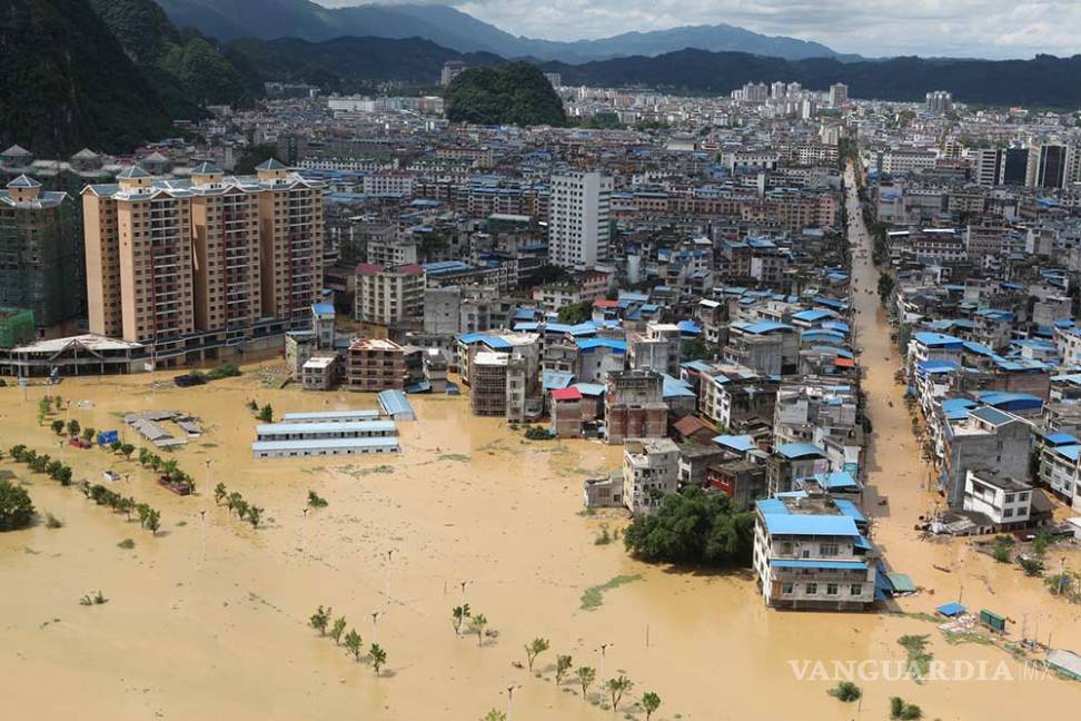 $!Lluvias ahogan a China; al menos 16 muertos y casi 100 mil evacuados