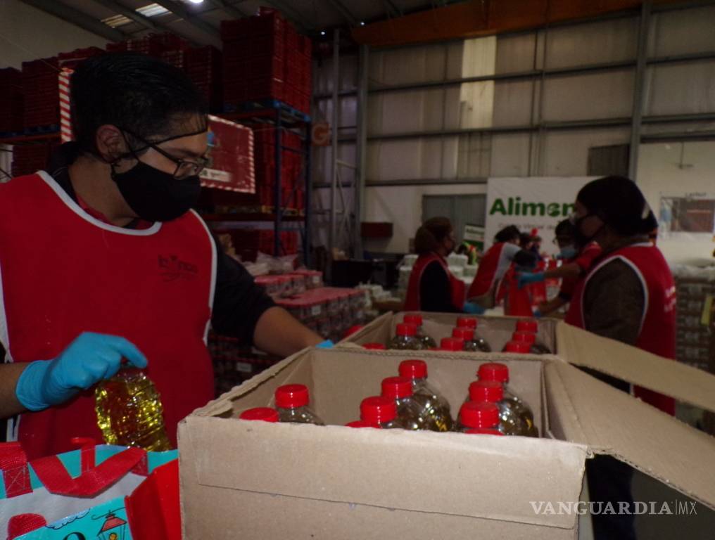 $!Sin posada por COVID; pero con despensa y bolo, manos a la obra en el Banco de Alimentos