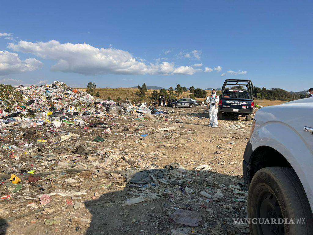 $!Su cuerpo fue localizado dentro de bolsas en un basurero ubicado en el municipio colindante de Santiago Tianguistenco