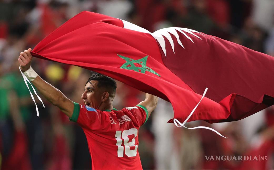 $!El jugador marroquí Jawad El Yamiq celebra la victoria de su selección ante Portugal.