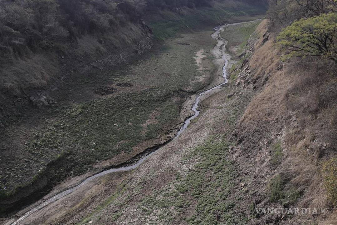$!Vista del escaso caudal de un río que alimenta la represa Los Laureles, que abastece de agua a Tegucigalpa (Honduras)
