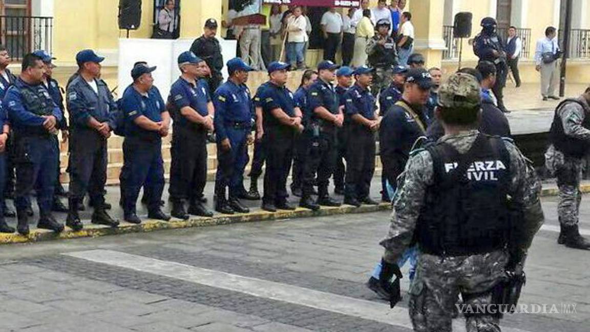 $!Suman 8 policías de Papantla detenidos por desaparición de 3 jóvenes