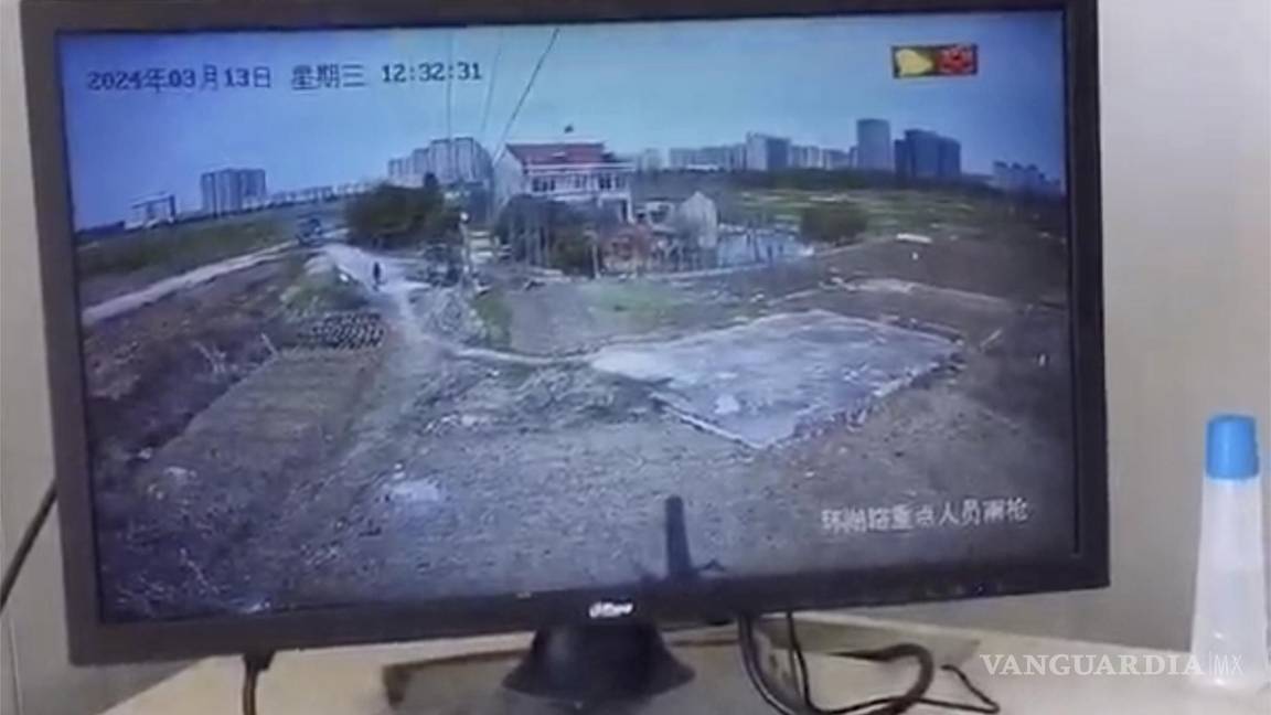 $!Una pantalla muestra la vigilancia de la casa Yang desde un puesto policial al otro lado de la calle en Changzhou, en el este de la provincia oriental china de Jiangsu.