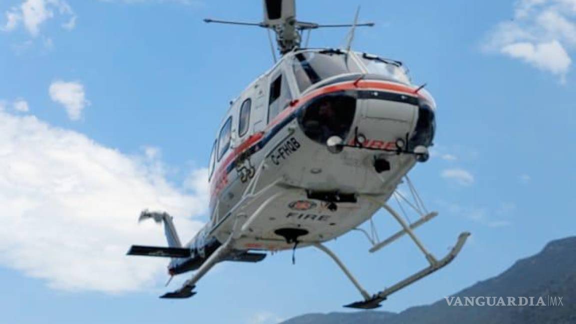 Helicóptero de la Marina se suma al combate de incendio forestal en Nuevo León