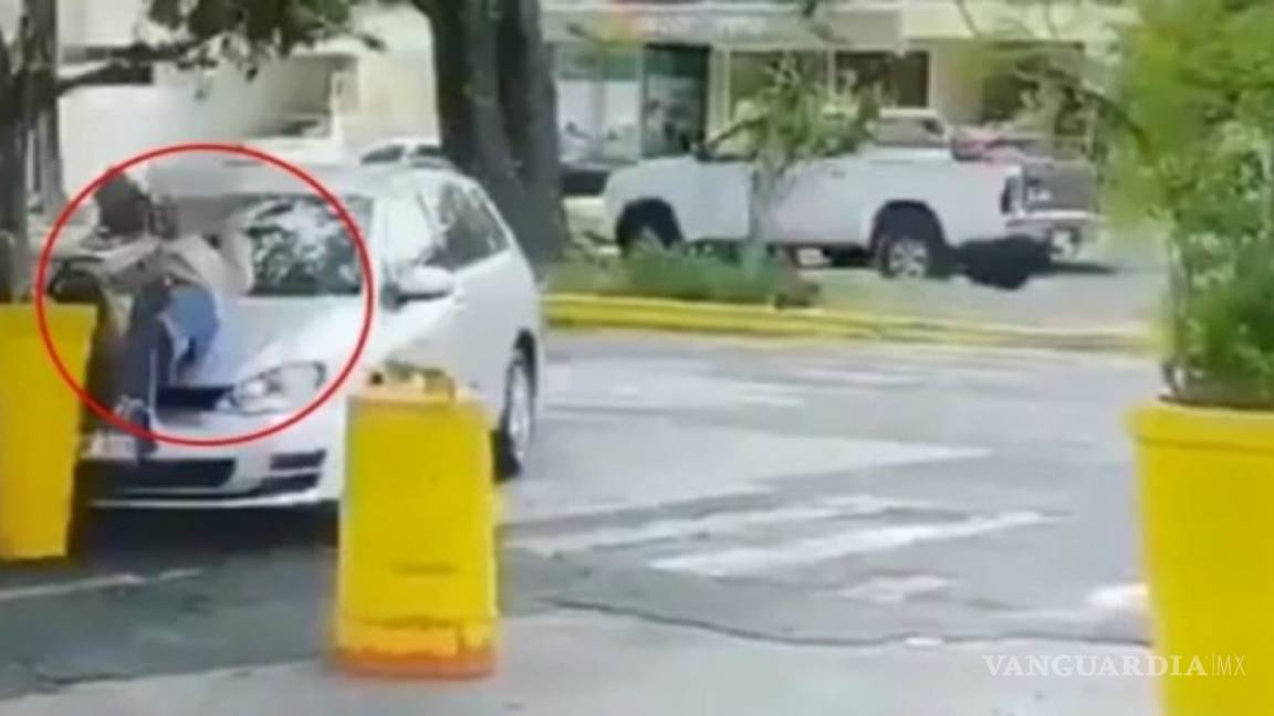 Video muestra como un hombre atropelló y apuñaló a su esposa; un escolta lo mató