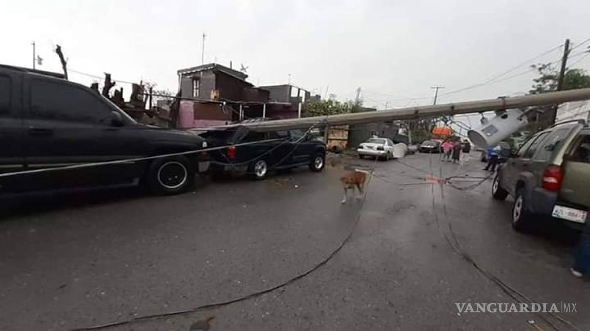 $!Azota fuerte tormenta a Nuevo Laredo; deja desgajamientos y vehículos dañados