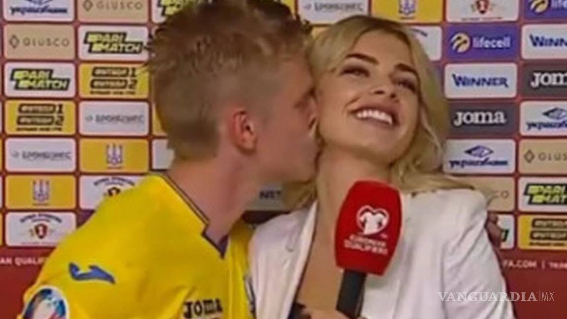 Zinchenko hace un 'Iker Casillas' y besa a reportera en plena entrevista