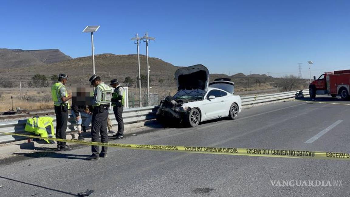 $!Personal de la Guardia Nacional y de la Fiscalía realizaron las diligencias en el lugar del accidente, al sur de Saltillo.