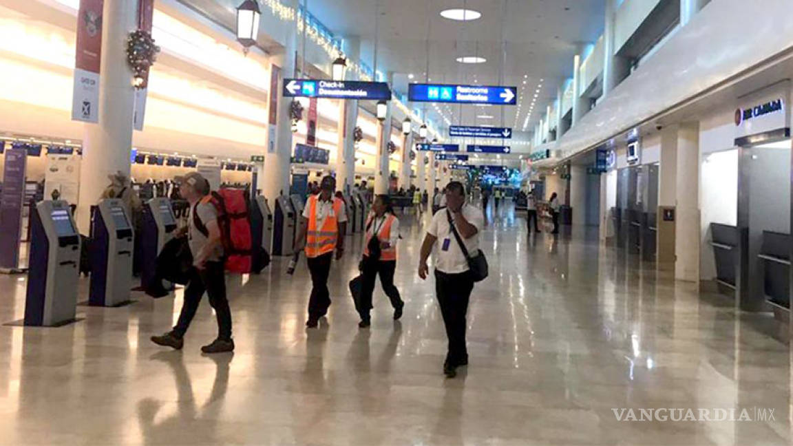 Retienen a grupo de turistas de Rumania en aeropuerto de Cancún