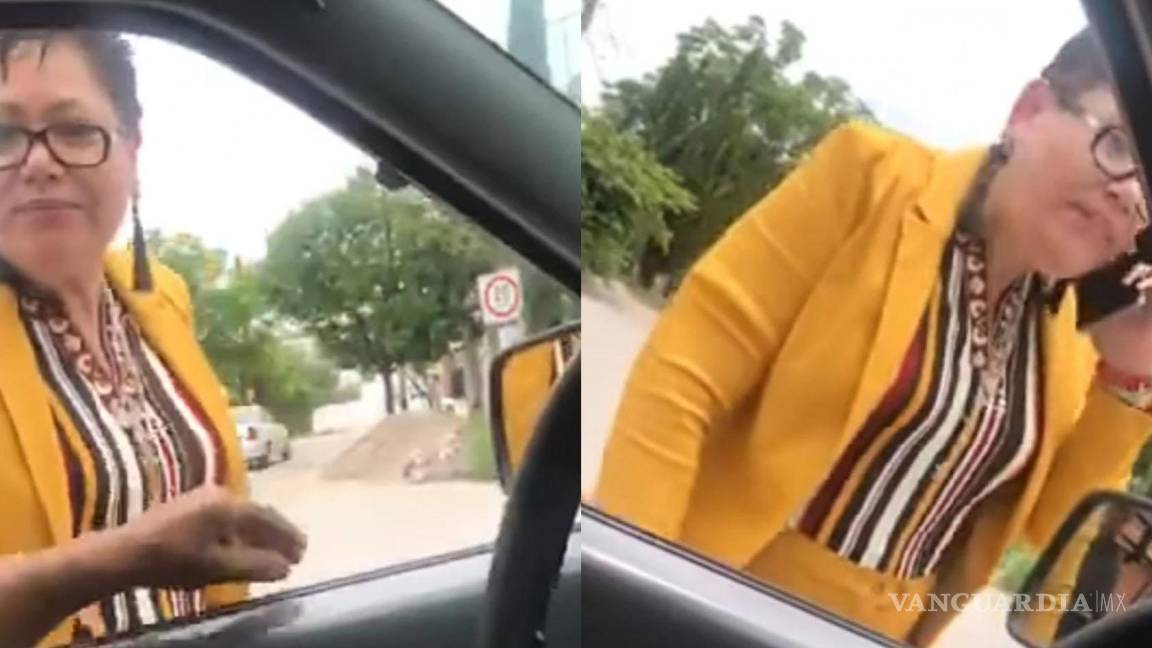 Lady Presidenta... mujer golpea auto con bate y amenaza a conductor (video)
