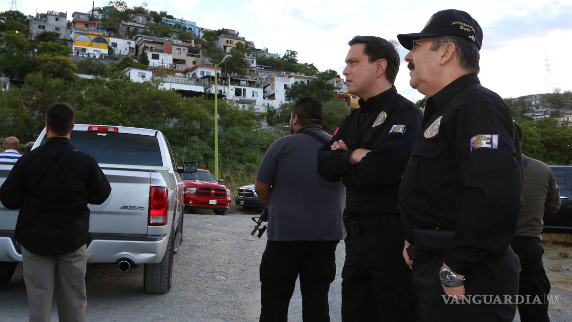 Elementos de la PGJNL detienen a14 personas en macro cateo en Monterrey