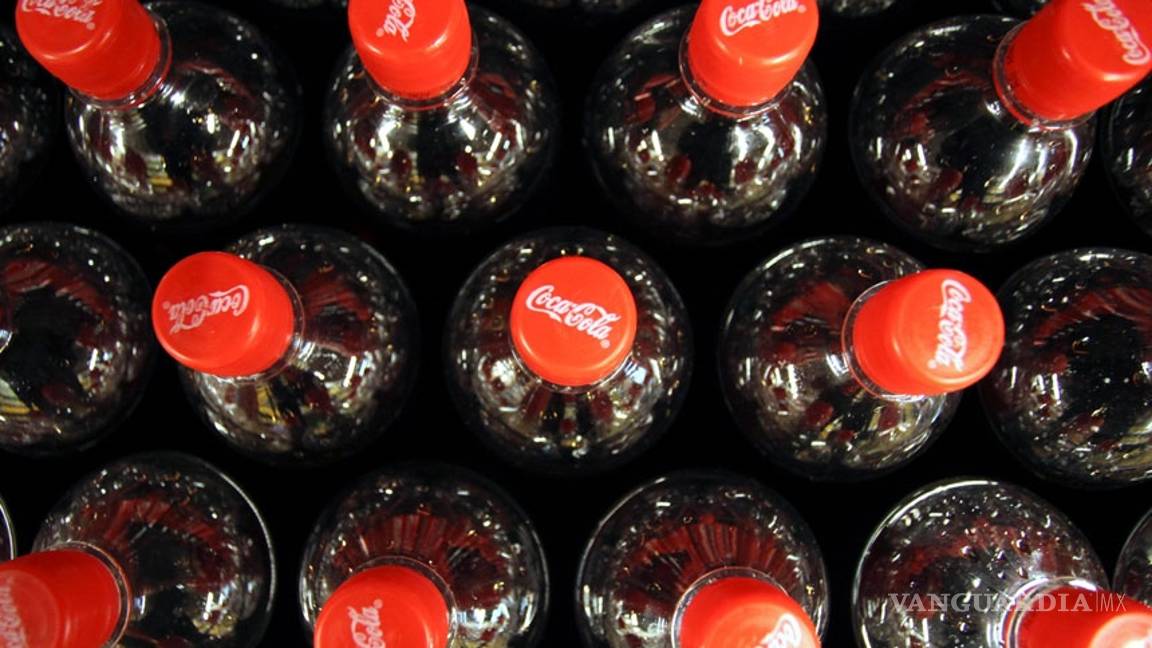 Embotelladora de Coca Cola compraría ingenios azucareros