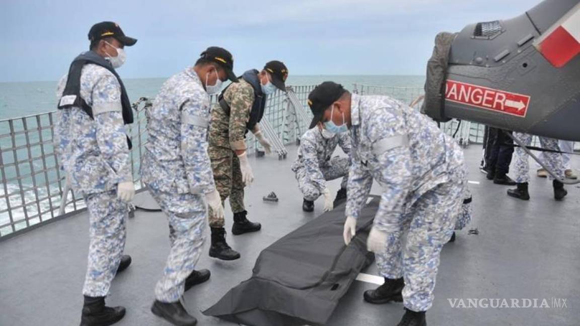 Recupera la Armada de EU restos de 10 marineros desaparecidos tras choque