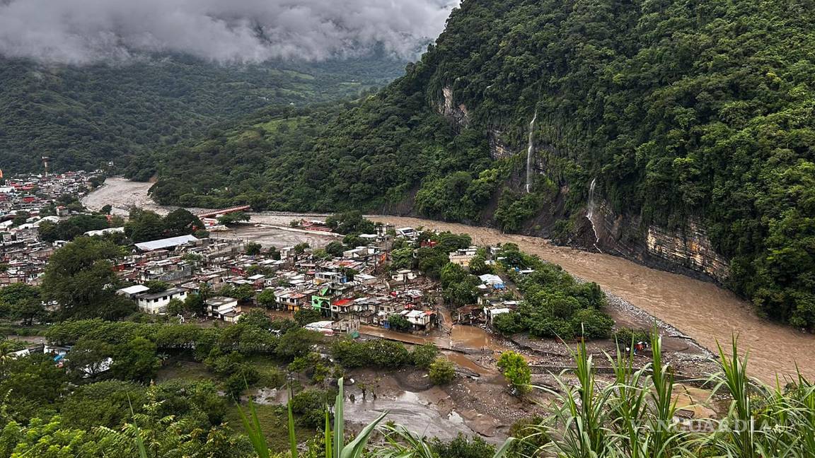$!Fotografía aérea que muestra zonas afectadas por las fuertes lluvias en Huehuetla, Hidalgo (México).