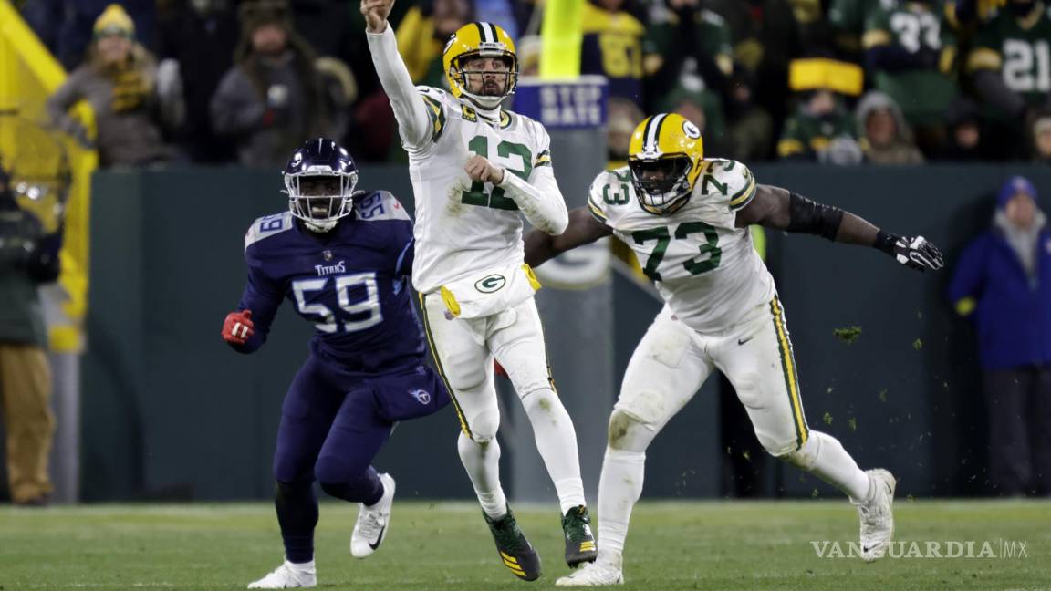 Aaron Rodgers, quarterback de Packers de Green Bay, revela que ha jugado con un dedo fracturado