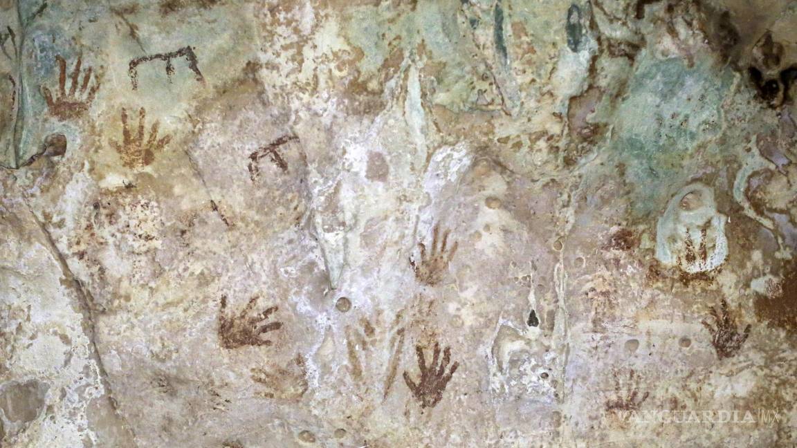 Maravillan a los turistas el legado de los mayas impreso en una pintura rupestre en Yucatán