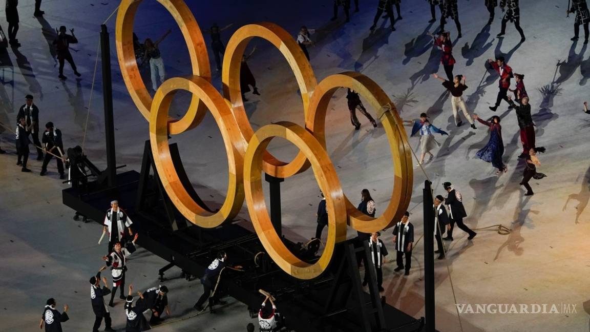 $!En imágenes; sin público, un espectáculo colorido y manifestantes anti-olímpicos se inaugura Tokio 2020