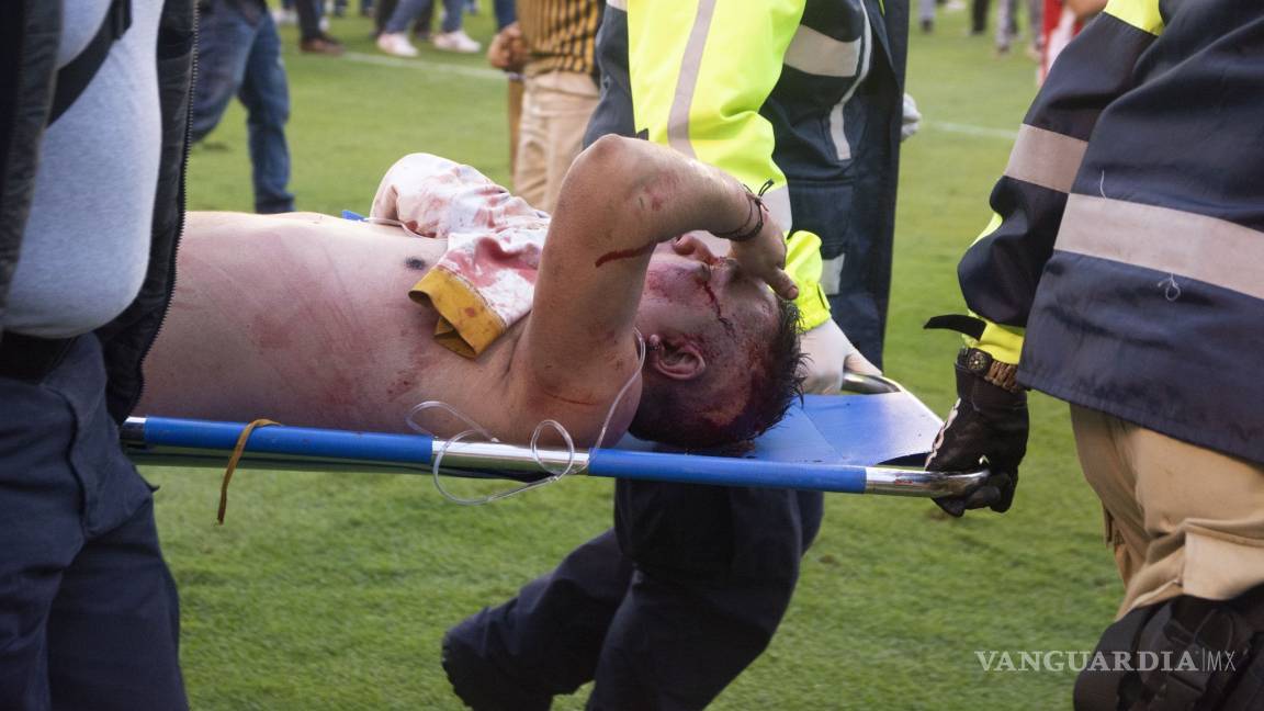 Así fue la brutal pelea en el estadio del San Luis (fotos)