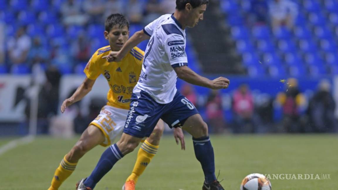 Expulsión de Ferretti y Sánchez Sola protagoniza empate entre Puebla y Tigres