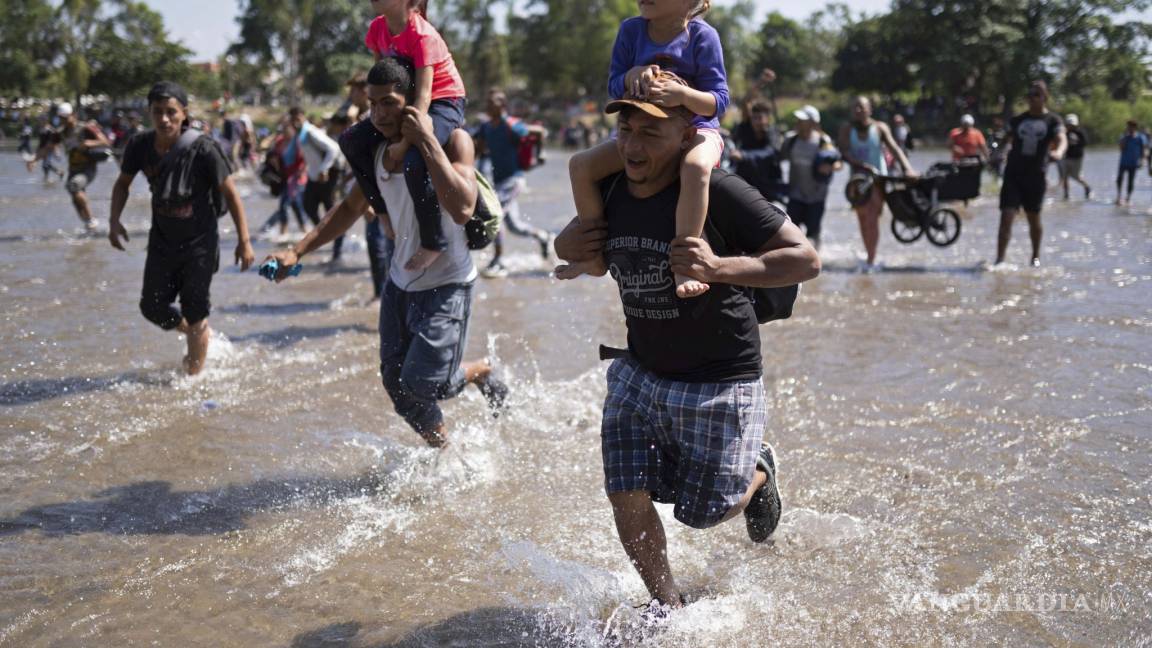 Guardia Nacional frena a migrantes que intentaron cruzar a México por río Suchiate