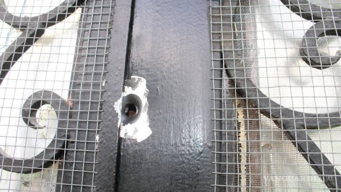 $!Los orificios de las balas.