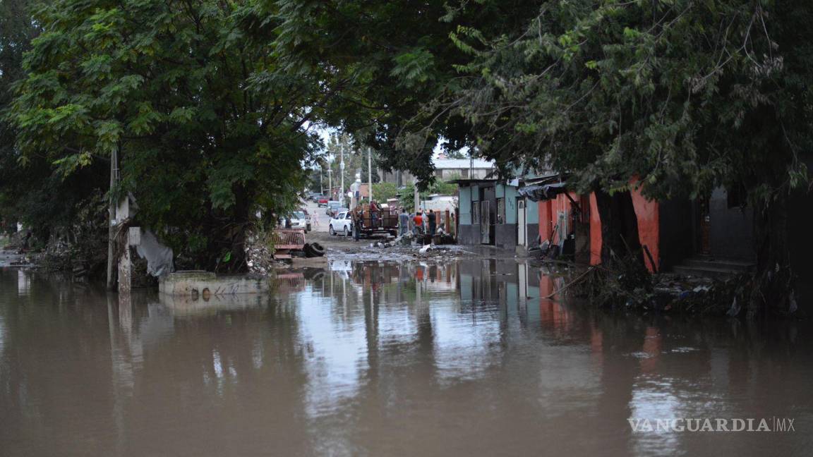 $!Tras fuertes lluvias se registraron desbordes de arroyos en la Región Carbonífera de Coahuila, donde el municipio de Múzquiz quedó prácticamente bajo el agua