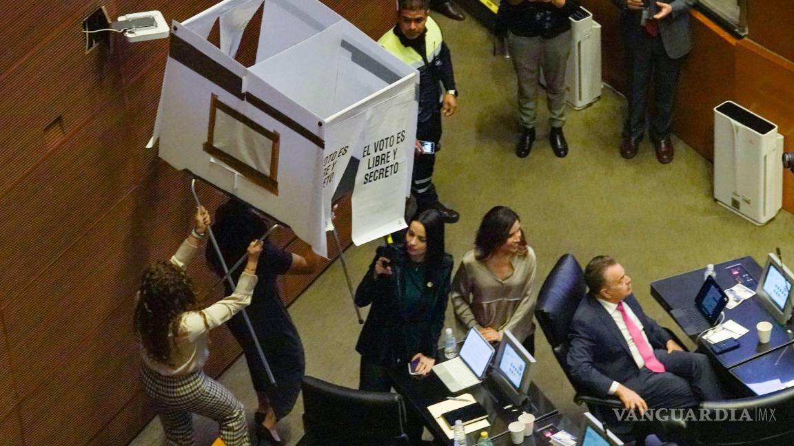 Chocan Morena y la oposición durante votación CNDH en el Senado... hasta colocan una mampara