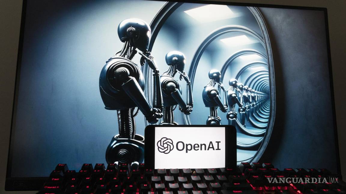 $!El logotipo de OpenAI se ve en un teléfono celular con una imagen en la pantalla de una computadora generada por el modelo de texto a imagen Dall-E de ChatGPT.