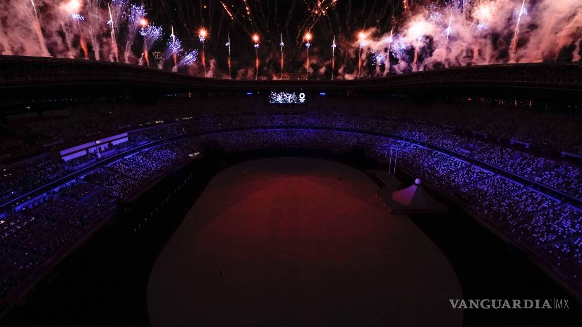 $!En imágenes; sin público, un espectáculo colorido y manifestantes anti-olímpicos se inaugura Tokio 2020