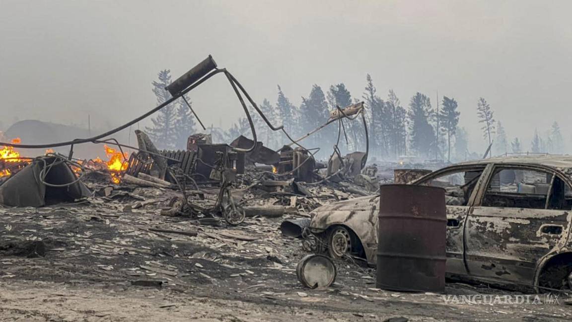 $!Una vista de la aldea de Byas-Kuel, después de un incendio forestal, en el Lejano Oriente de Rusia. AP/Vadim Skryabin/NewsYkt