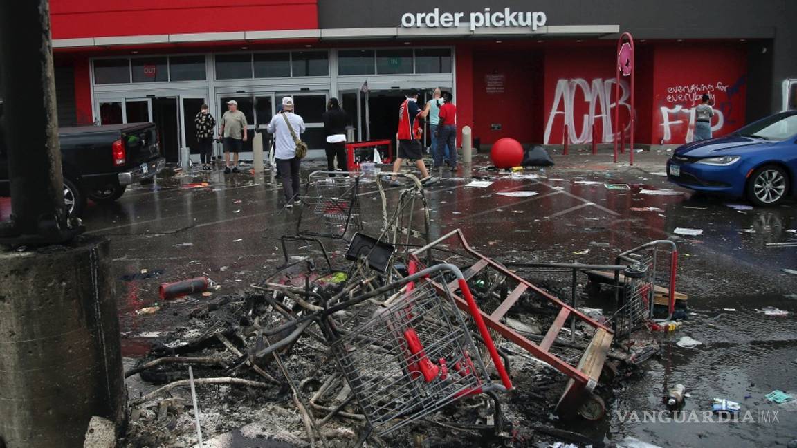 $!Violentas protestas y saqueos en Minneapolis por la muerte de George Floyd por abuso policial (fotos)