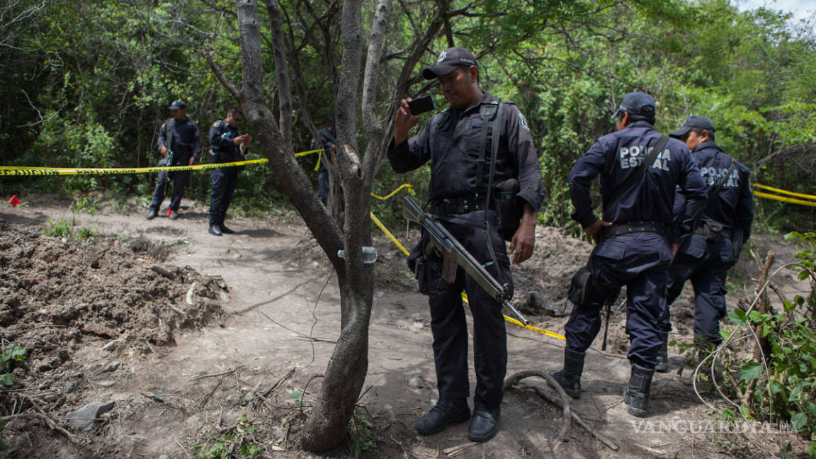 Hallan restos humanos en dos predios de Iguala