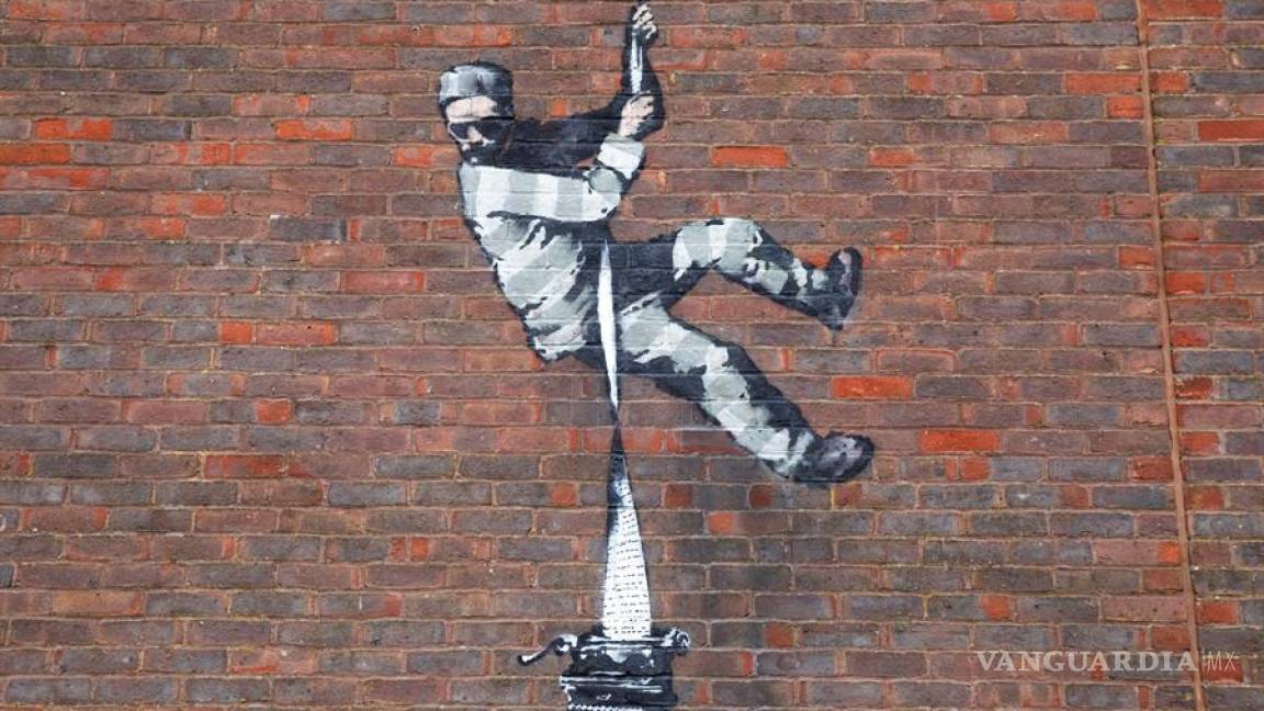 Banksy confirma ser el creador de “Create Escape” en un muro de una prisión de Inglaterra