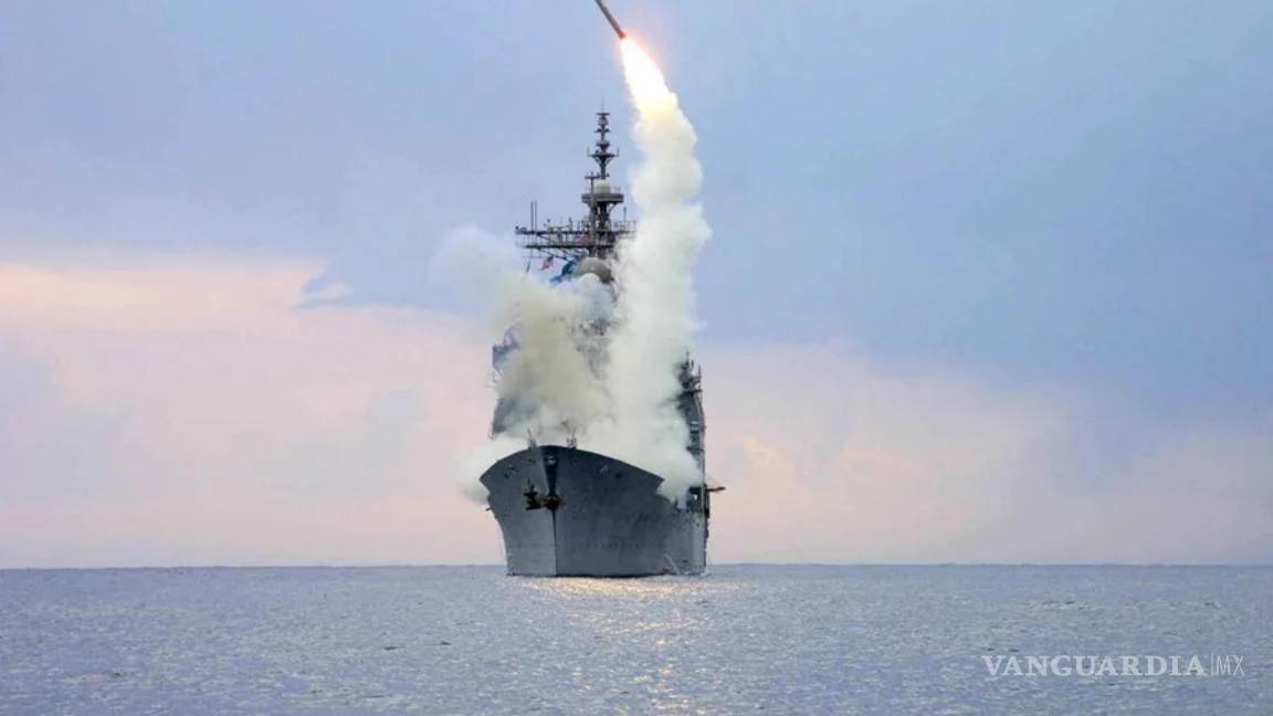 $!Lanzamiento de un misil de ataque terrestre Tomahawk (TLAM) desde el crucero de misiles guiados USS Cape St. George de la Armada de EU.