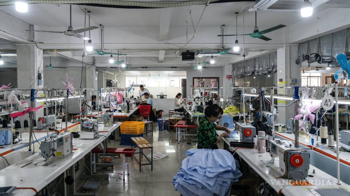 $!Una fábrica textil en Guangzhou, China. El líder chino, Xi Jinping, intenta posicionar a China como un defensor del libre comercio y el liderazgo global.