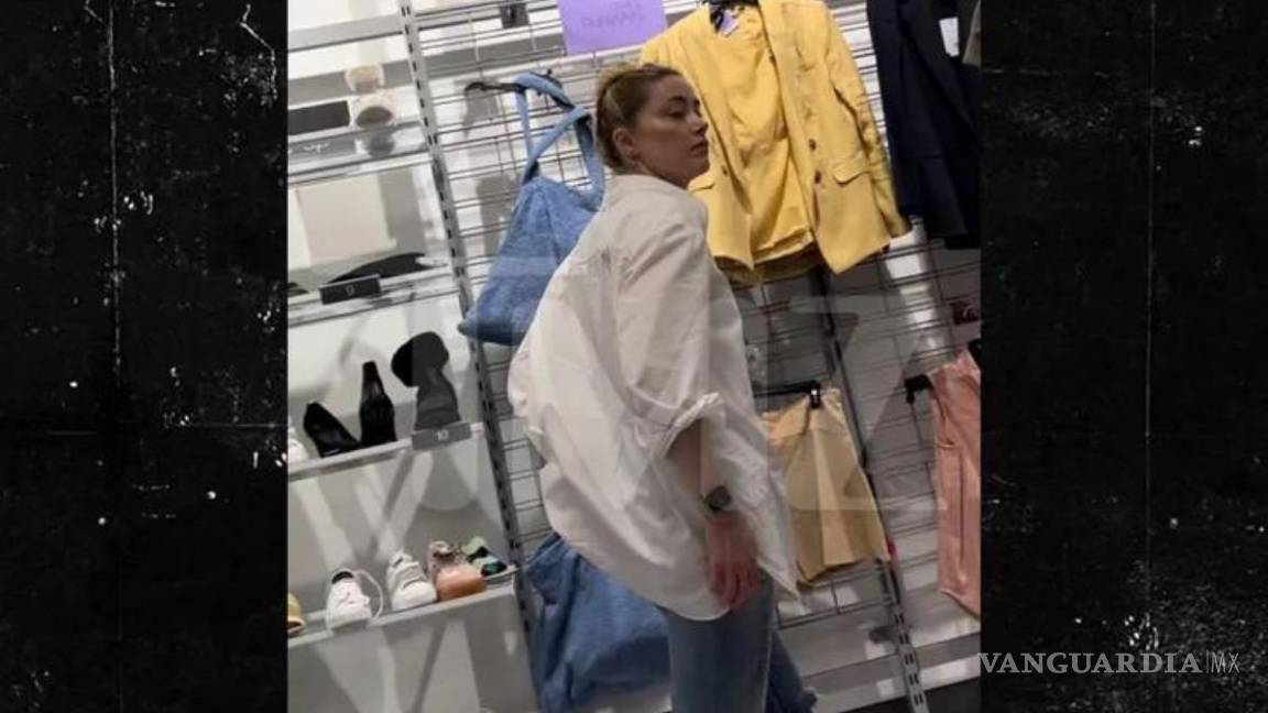 Captan a Amber Heard comprando ropa en una tienda económica