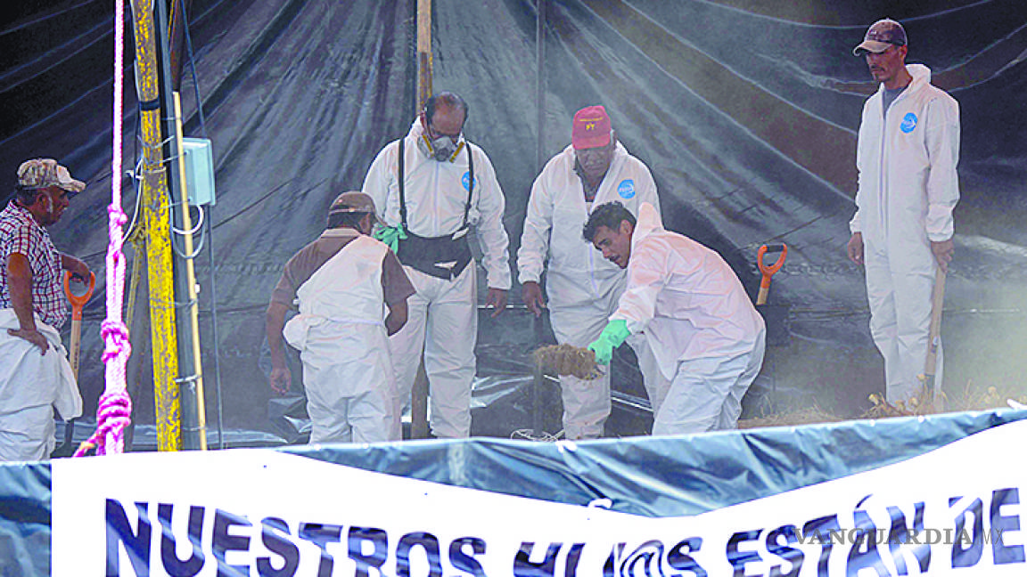 La CNDH atestigua exhumación de restos en fosas de Tetelcingo