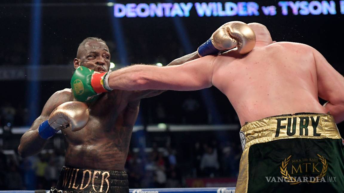 $!Increíble KO de Deontay Wilder para vencer a Tyson Fury en una emocionante batalla de pesos pesados