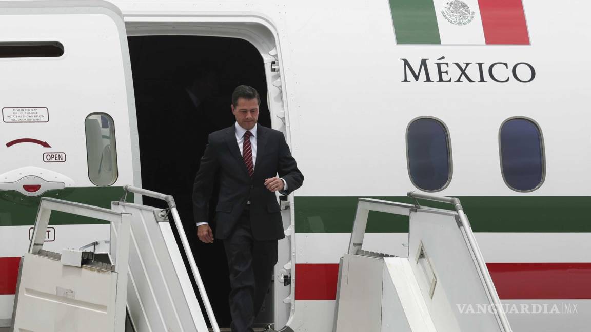 Enrique Peña Nieto regresa a México tras firma del T-MEC