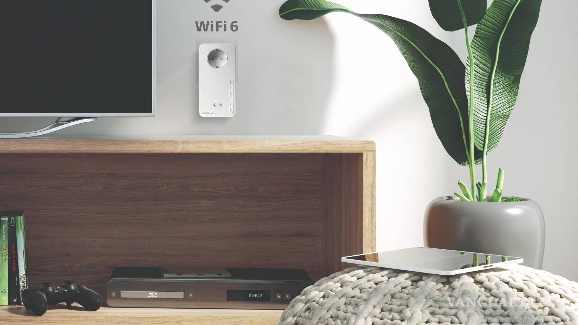 $!Adaptador de red wifi Powerline conectado a red eléctrica.