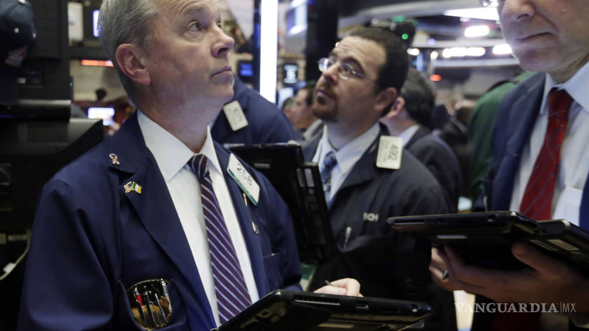 Wall Street sube; GM y Ford pierden terreno