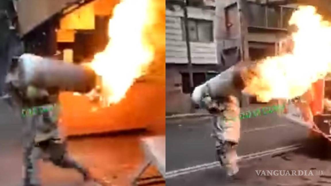 ¡Superhéroe!... Bombero de CDMX cargó tanque de gas en llamas para evitar una explosión (video)